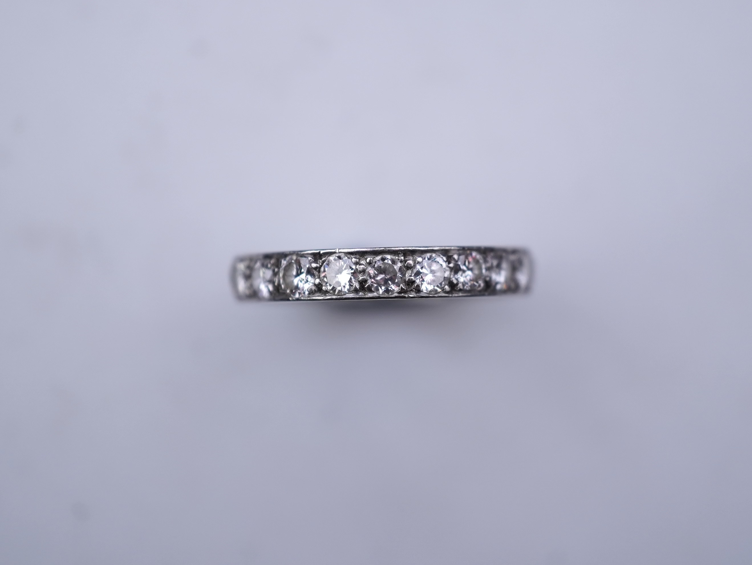 A diamond eternity ring, mid 20th century